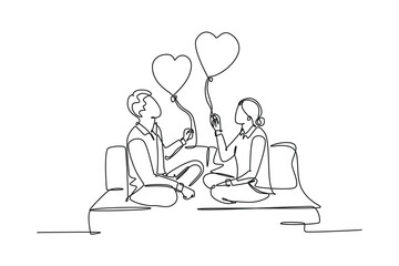Single continuous line drawing young happy man and woman couple sitting on the couch and holding heart shape balloon together. Romantic dating concept. One line draw graphic design vector illustration