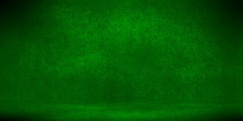 photo background green. textured wall rolling in the floor. studio photography background illuminated by the directed light Traditional painted canvas or muslin fabric cloth studio backdrop