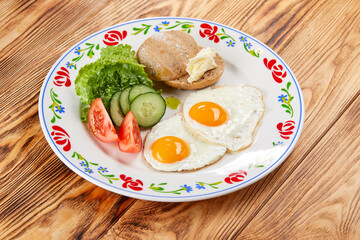 Fototapeta na wymiar traditional breakfast on the wooden table