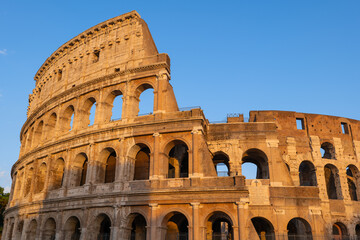 Fototapeta premium Ancient Colosseum In Rome At Sunset