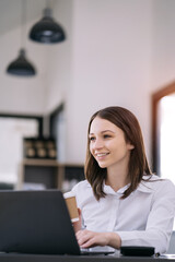 Women are sitting searching for information.