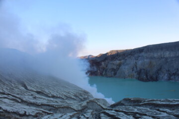 Fototapeta na wymiar Kawah Ijen volcanic ,Sulfur fumes from the crater of lake in East Java, Indonesia