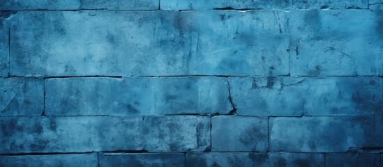 Blue textured wall serving as a designers background