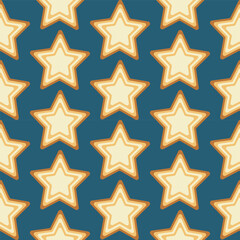 Cookie stars seamless pattern on blue background. Vector design.