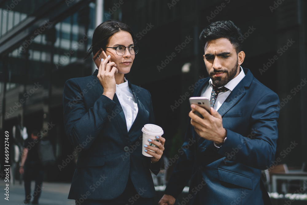 Poster puzzled spanish entrepreneur checking notification for smartphone application for dialing number