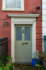 Fototapeta na wymiar Red painted door in Ireland. Typical architecture