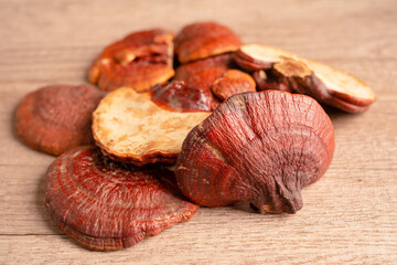 Dried lingzhi mushroom with capsule drug, alternative medicine herbal organic herb.