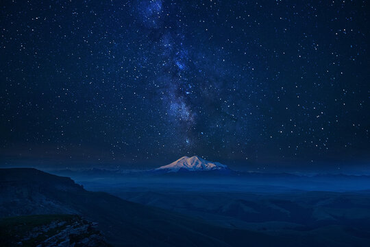 Night landscape on peaks of Mount Elbrus. Big high mountain covered with snow, Caucasus Mountains, Russia