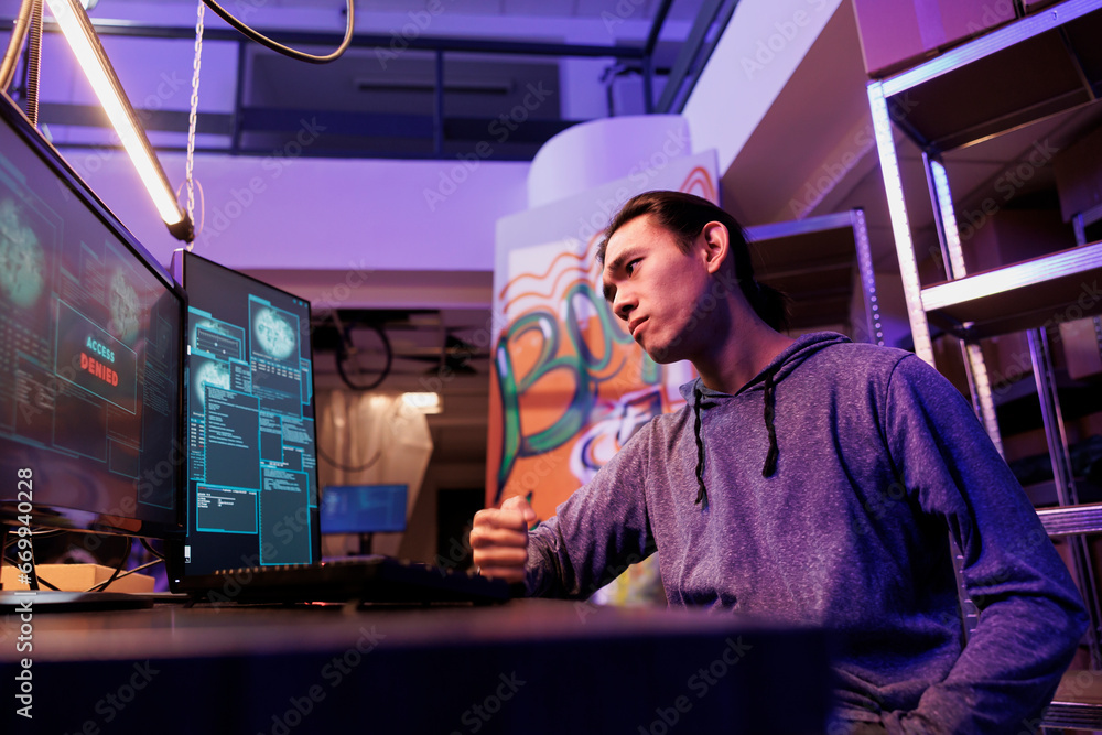 Poster sad hacker failing to pass security system while cracking password unsuccessfully. upset asian man g