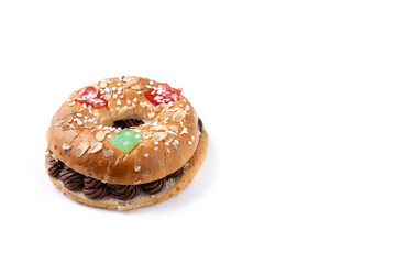 Individual Epiphany cake roscon de reyes with chocolate stuffed isolated on white background. Copy space
