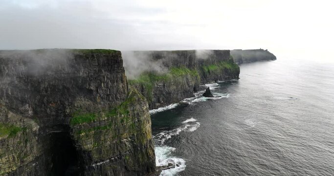 Cliffs Moher shrouded in low clouds 4k
