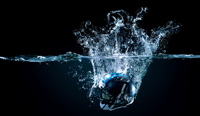 American football helmet in water