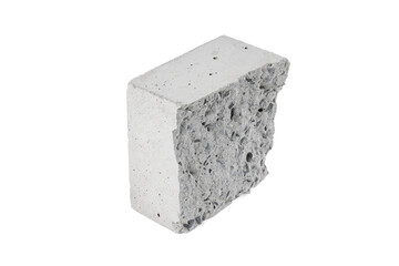 Broken cement cube shape damage from compression test strength on white isolated background