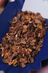 Closeup cascara coffee tea made from dried skins of plant berries. Natural health organic drink