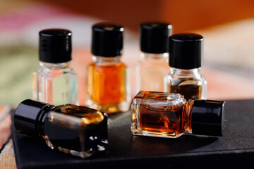Sample aroma kit scents of colored perfume bottles with different types. Concept education...