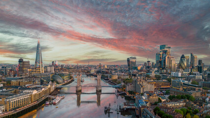 London, England. Aerial view of London at sunrise looking over Tower Bridge, Tower of London, river Thames and Financial district. 