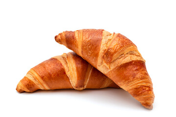 Fresh croissants on a white background close-up. French pastries