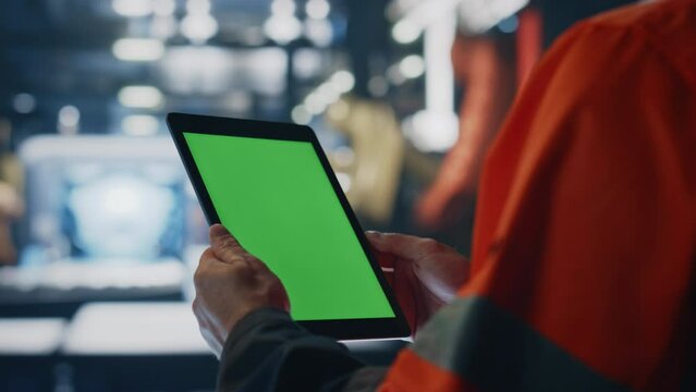 Closeup technician working mockup tablet checking production. Unknown engineer