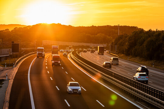Germany, Baden-Wurttemberg, Kirchheim unter Teck, Traffic on Bundesautobahn 8 at sunset