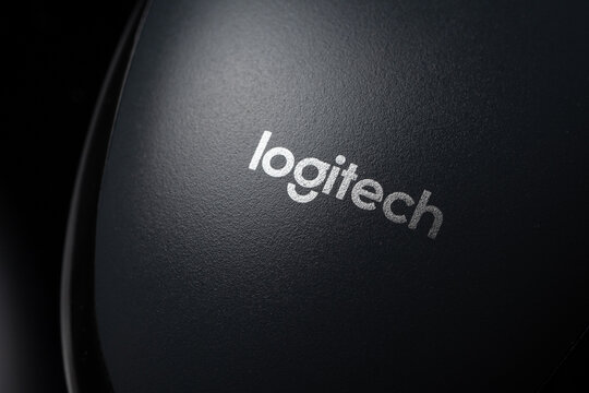 Illustrative editorial of Logitech logo on computer mouse. Logitech is a Swiss manufacturer of computer mice, keyboards, and peripherals. KHARKIV, UKRAINE - October 30, 2023.