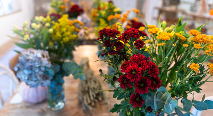 Natural flowers. Floral arrangement workshop with autumn flowers.