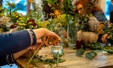 Natural flowers. Floral arrangement workshop with autumn flowers.