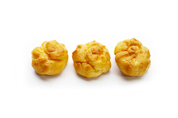 Cream puffs on white background