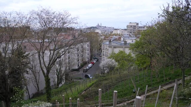 Paris France - Avril 7, 2021: A view of the North of Paris and Montmartre from the Bergeyre hill.