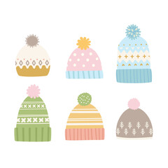 Set of winter hats with a pattern. Knitted hats with pompoms for fall. Head protection in cold weather