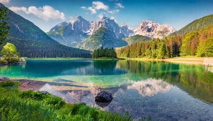 colorful summer view of fusine lake bright morning scene of julian alps with mangart peak on background province of udine italy europe traveling concept background - obrazy, fototapety, plakaty