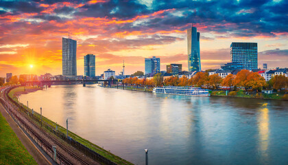 incredible autumn sunset on the rhein river spectacular evening cityscape of dusseldorf with...