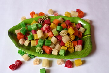 Raw fryums snack. Its other names Far far.  It's deep fried, and they are either eaten as a snack or served like a papadum to accompany a meal. Indian snack composed primarily of potato starch, sago.