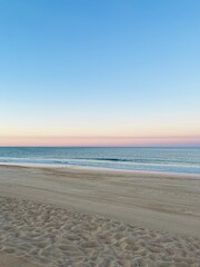 Calm sea horizon, early morning, before the sunrise at the sea, pastel colors