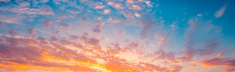 Majestic morning colorful sunlight sky clouds. Heavenly light reflected on fluffy clouds in golden...