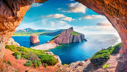 Deurstickers astonishing summer view of caccia cape from the small cave in the cliff fabulous morning scene of sardinia island italy europe aerial mediterranean seascape beauty of nature concept background © Nichole