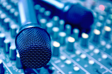 Wireless microphone is placed in the control room and records sound.