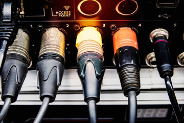 Signal cables on the back of the digital audio mixer