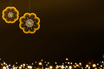 Winter Christmas background with blurred bokeh and two snowflakes.
