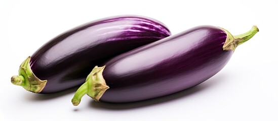 Three large purple vegetables on a blank canvas