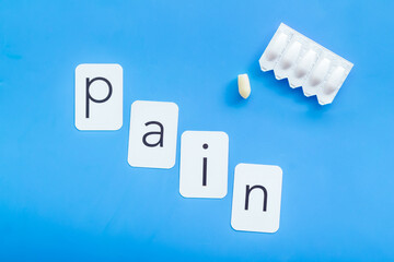 Word pain and rectal suppositories - medical treatment concept