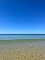 Transparent blue sea water, blue sea horizon, pure sky, natural blue seascape background