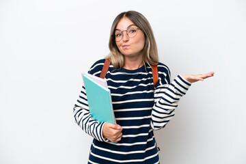 Young student Rumanian woman isolated on white background having doubts while raising hands