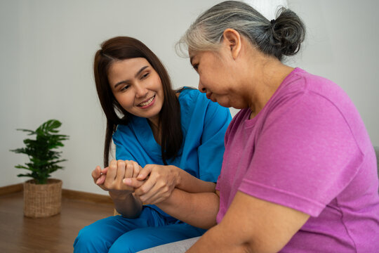 Caregiver for elderly talking with depression, dementia senior woman for protection melancholy trouble. Asian aging suffering from depression. Caregiver or nurse support happy retirement service.