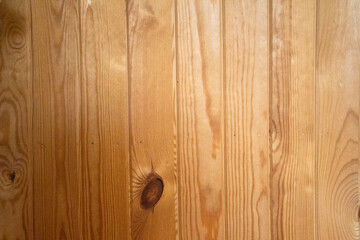 Bright chestnut wooden texture of a wall