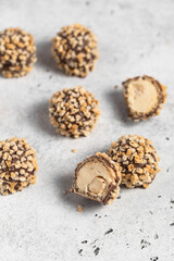 chocolate candy with praline and nuts
