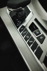 Detail of modern car interior, automatic transmission in expensive car
