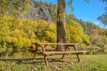 Beautiful views of the autumn wooden table, river Berounka, forest and mountains