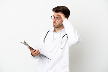 Young doctor caucasian man over isolated on white background wearing a doctor gown and holding a folder