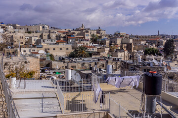 The roofs of houses and residential buildings at the Christian Quarter of Jerusalem Old Town in Israel. - obrazy, fototapety, plakaty