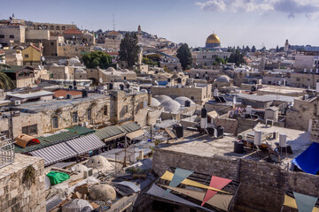 The Muslim shrine Dome of the Rock over the roofs of Jerusalem Old Town in Israel.